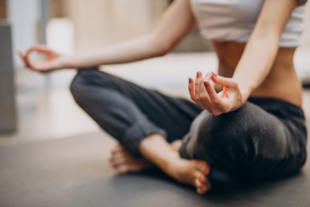 Yoga 1 young woman practicing yoga home
